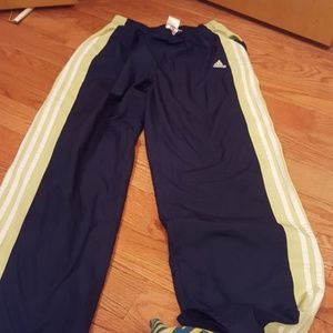 Adidas mesh lined green and white striped pants